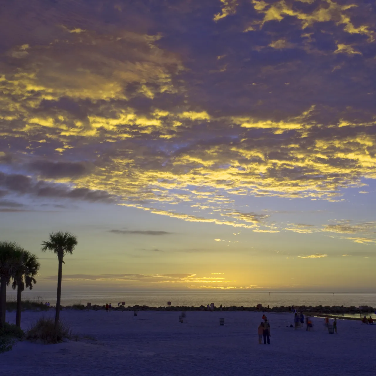 Florida coastline with clear water and white sand beach, representing the Gulf and Atlantic markets BookedLocal Studio serves