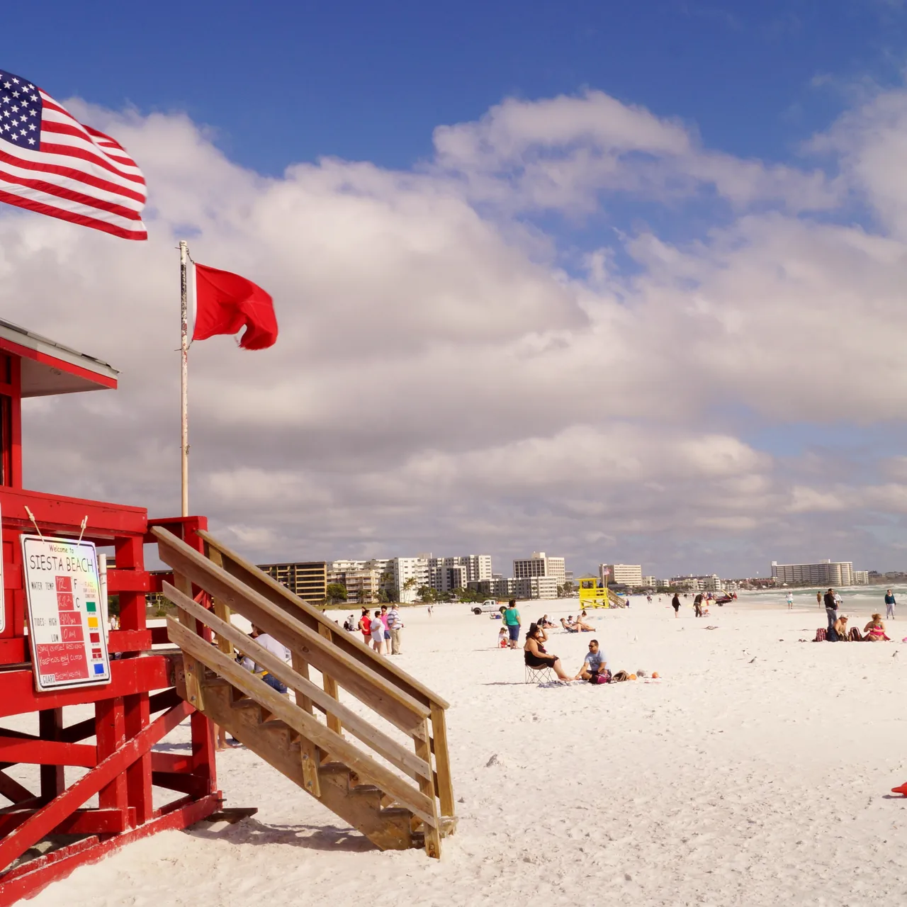 Red lifeguard stand on Siesta Key Beach, powdery white quartz sand and Gulf waters, Sarasota Florida